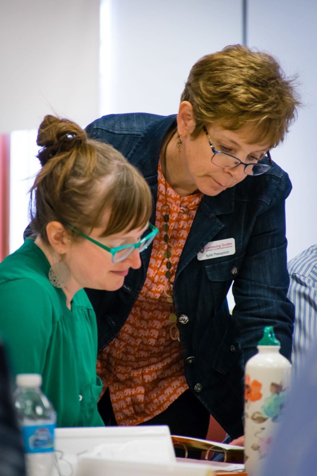 Advisor talking with a student.